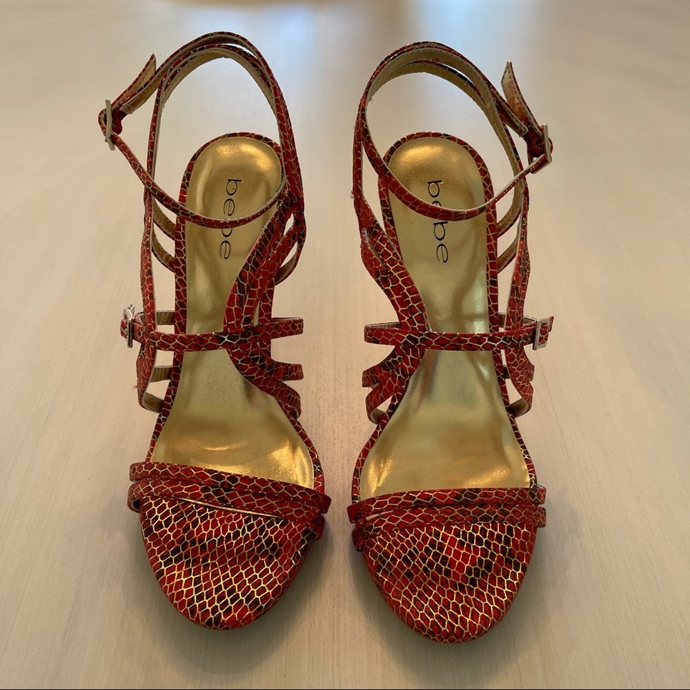 Bebe red/orange stiletto heel.